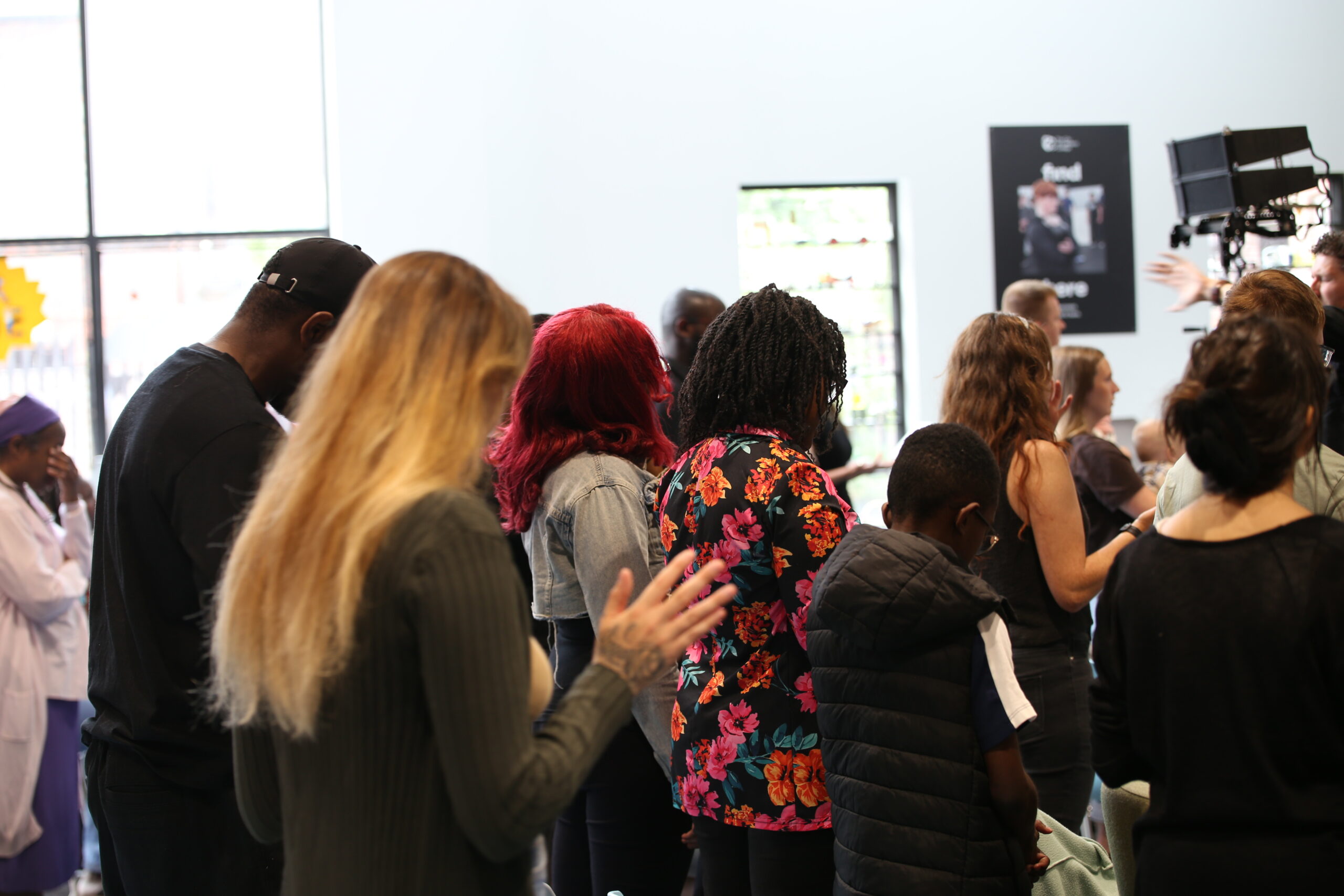 The congregation standing in worship at a C3 Liverpool Sunday service in Liverpool city centre